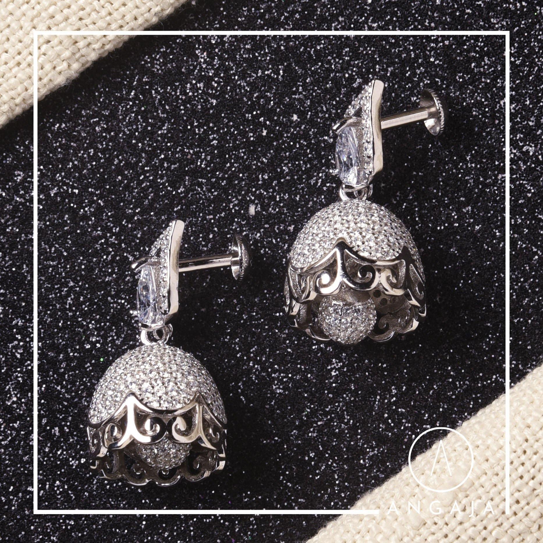 Classy American Diamond Stone Stud Earrings – Zuccii
